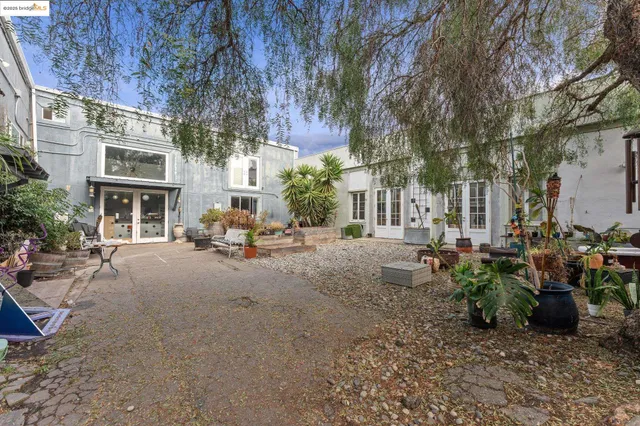 a view of a backyard of the house