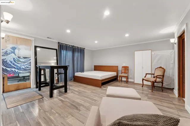 a bathroom with a sink a mirror and a shower