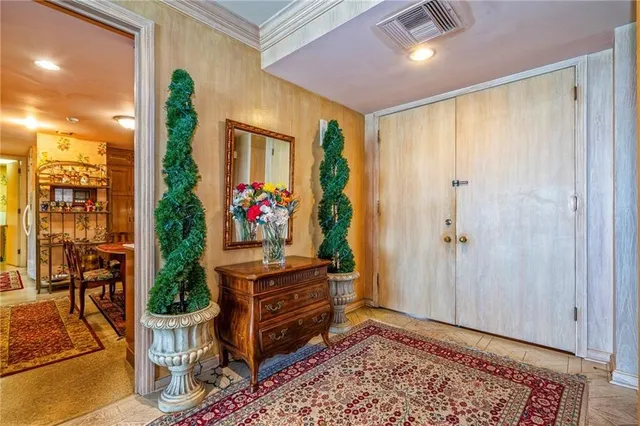 a living room with furniture or couch and a large window