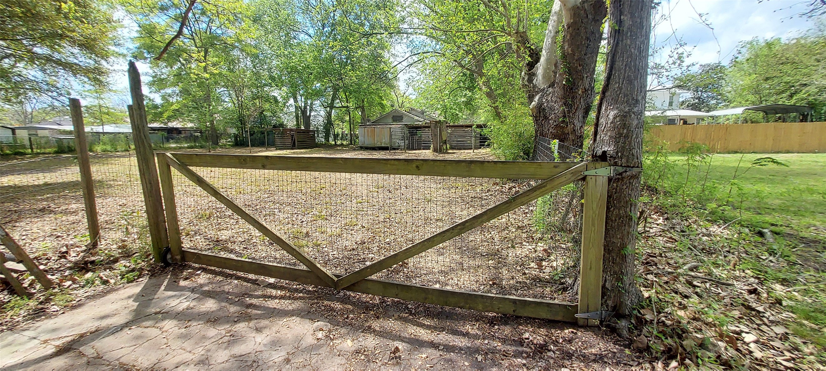 324 East Second Street Groveton, TX 75845 - Photo 15 of 20 a view of a backyard with sitting area