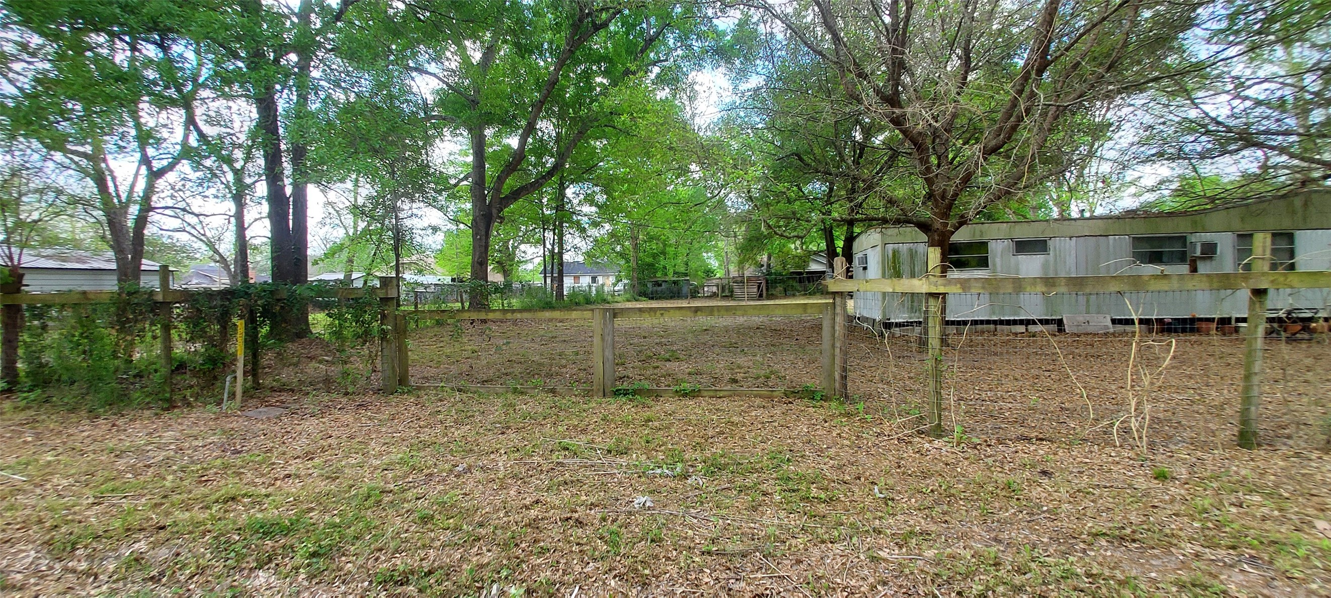 324 East Second Street Groveton, TX 75845 - Photo 19 of 20 a backyard of a house with lots of green space