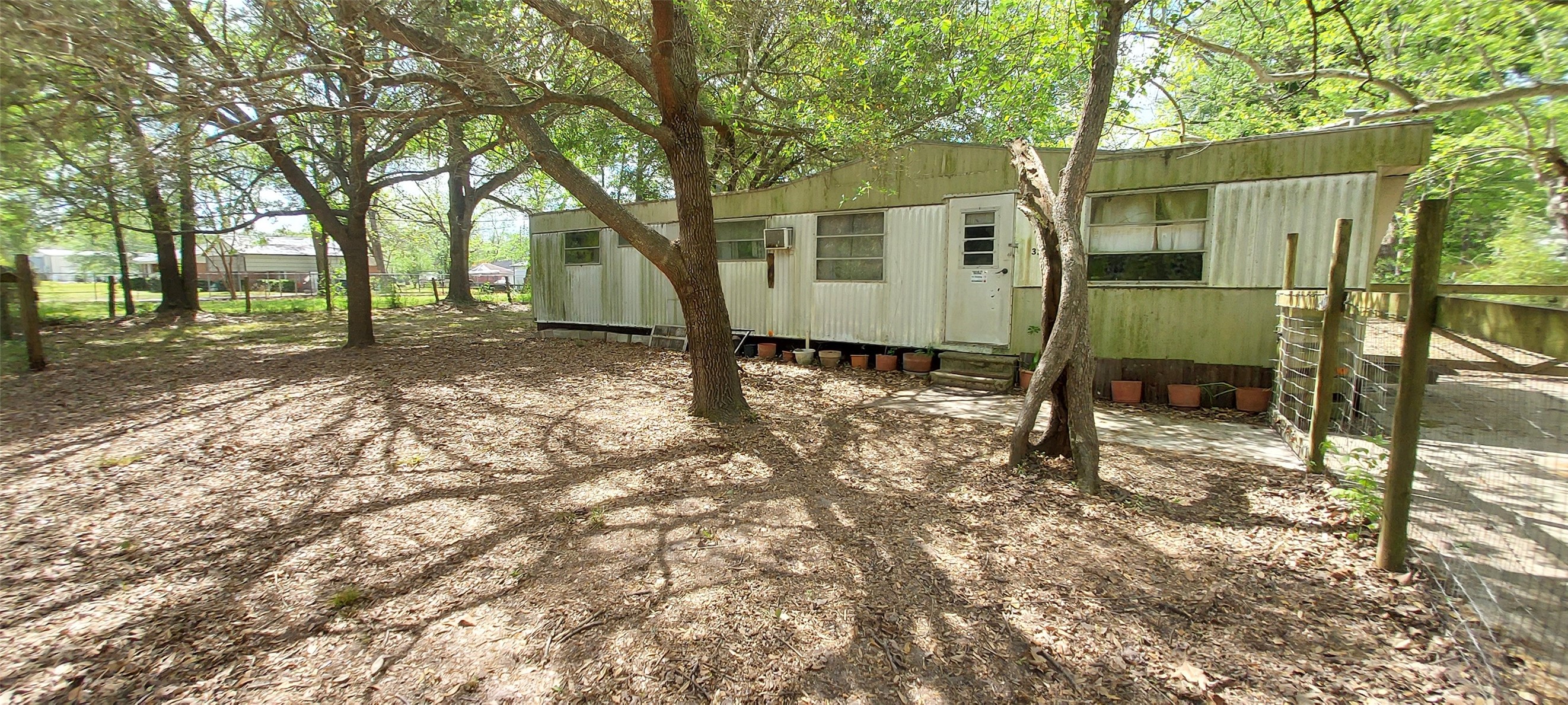 324 East Second Street Groveton, TX 75845 - Photo 3 of 20 a view of a house with a yard