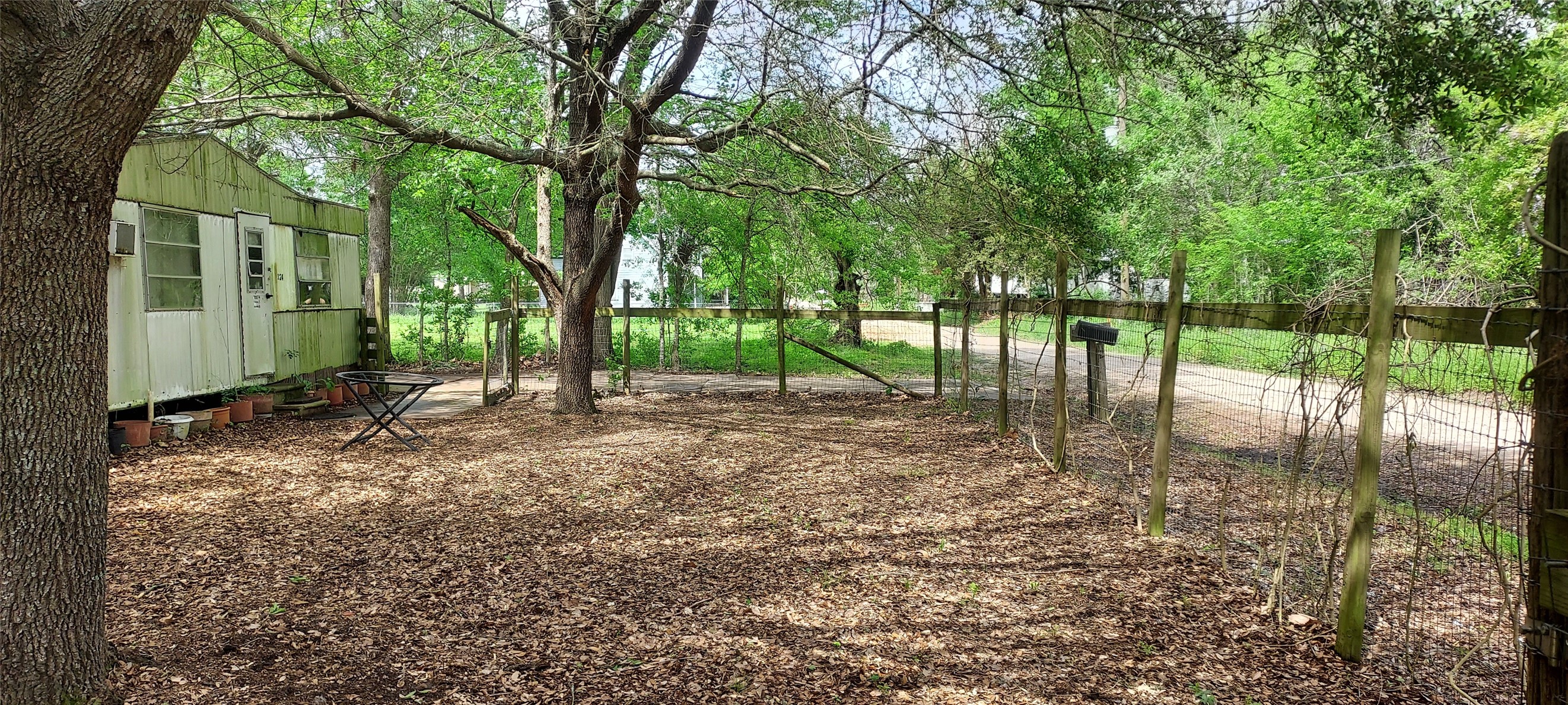 324 East Second Street Groveton, TX 75845 - Photo 5 of 20 a view of a backyard