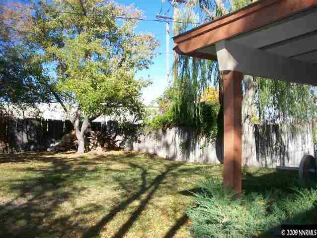 2565 Apollo Way Reno, NV 89503 - Photo 3 of 3 a backyard of a house with lots of green space