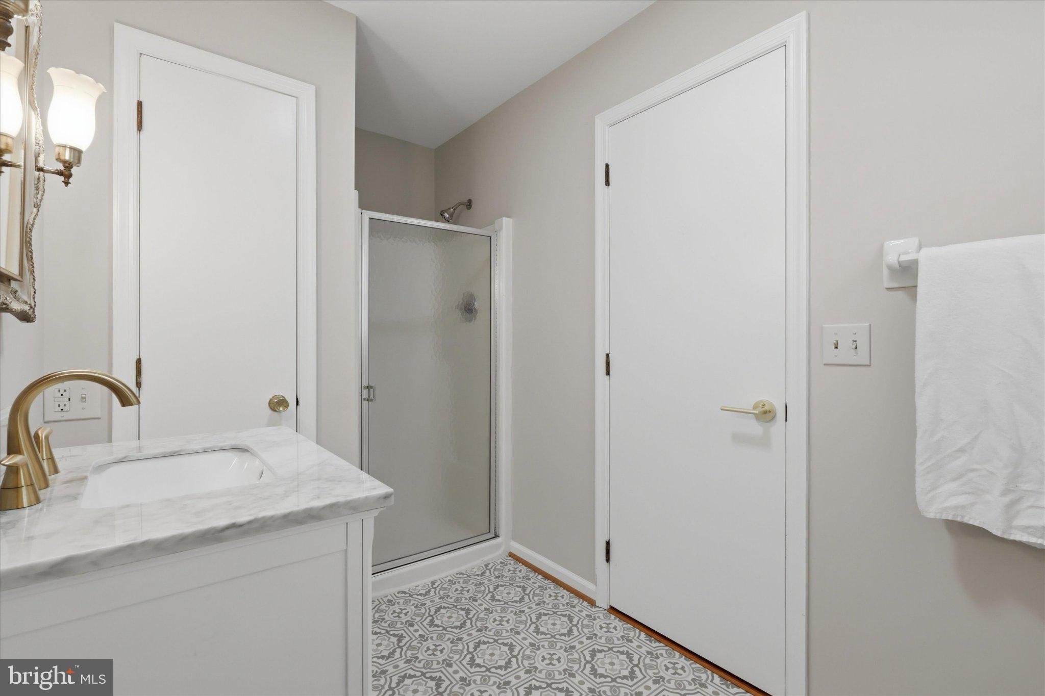7007 Runnymeade Court Frederick, MD 21702 - Photo 25 of 37 Elegant bathroom with modern finishes.