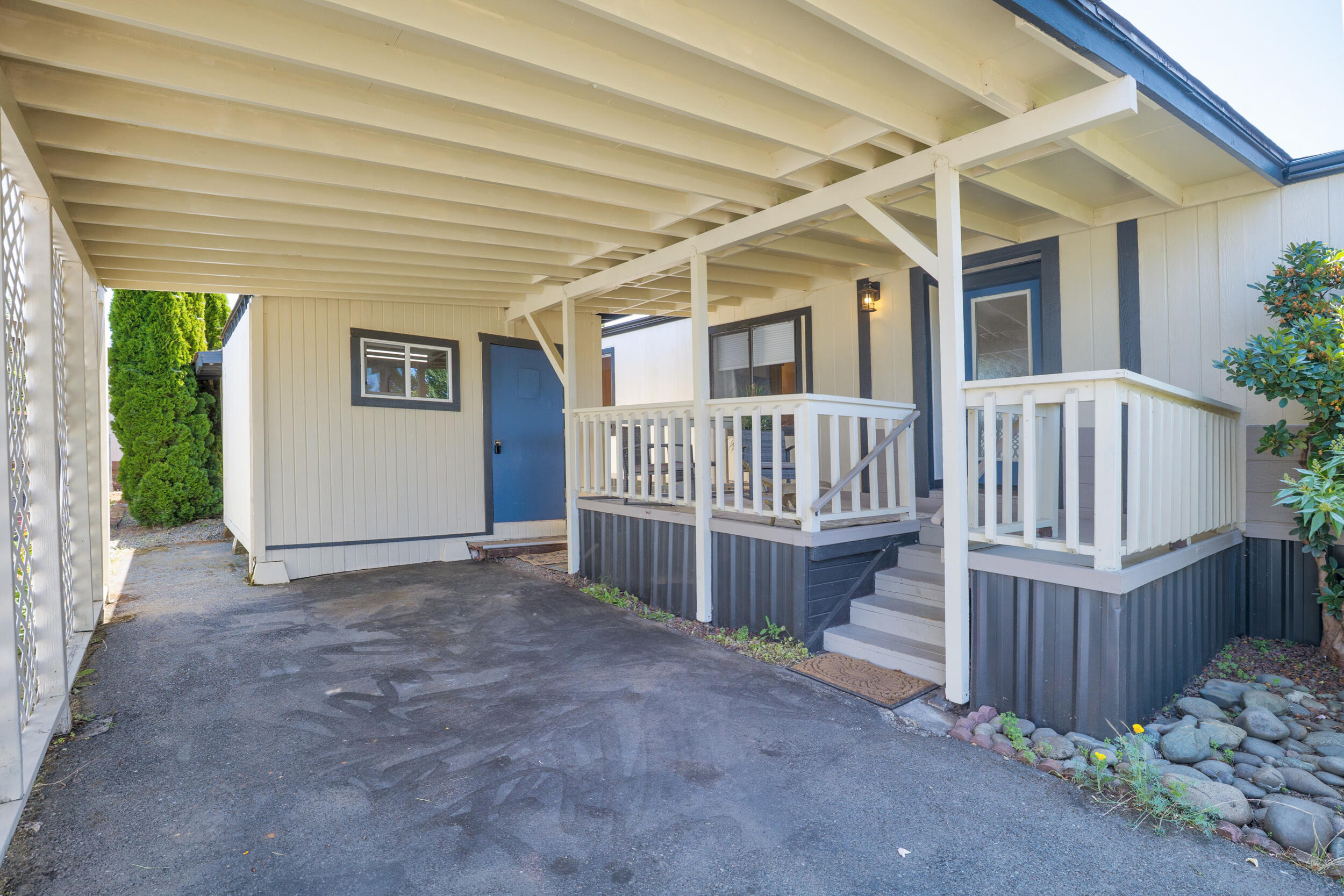 5076 Leonard Road, Unit 97 Grants Pass, OR 97527 - Photo 3 of 36 Great Shop location with window. Up the stairs to nice deck with dry or shades home access.