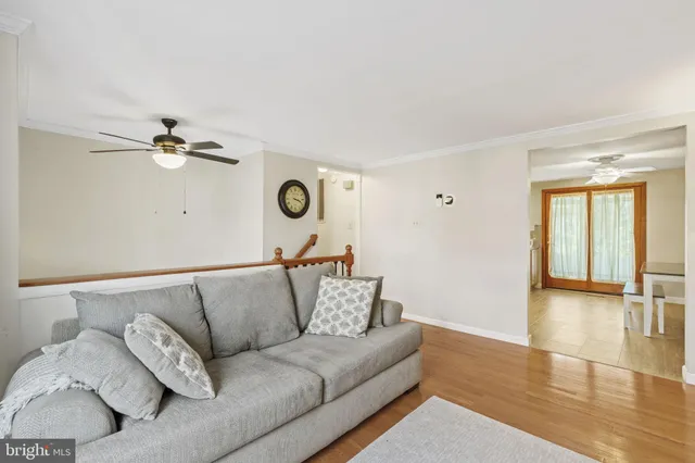 a bedroom with a bed and a desk