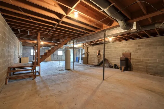 a view of an empty room with wooden roof
