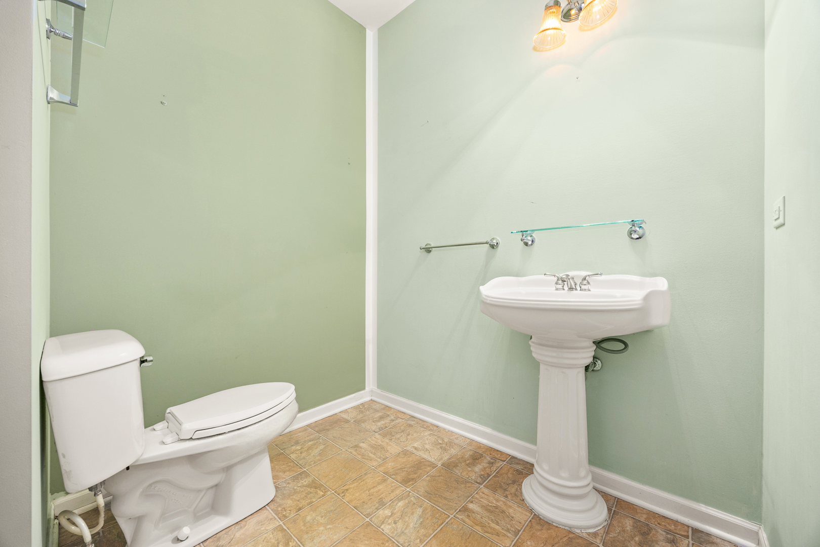 333 Claridge Circle Bolingbrook, IL 60440 - Photo 13 of 33 a bathroom with a sink toilet and a mirror