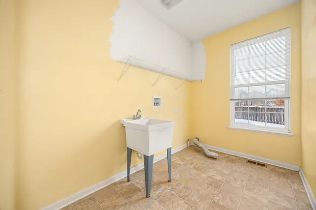 a view of a room with a window