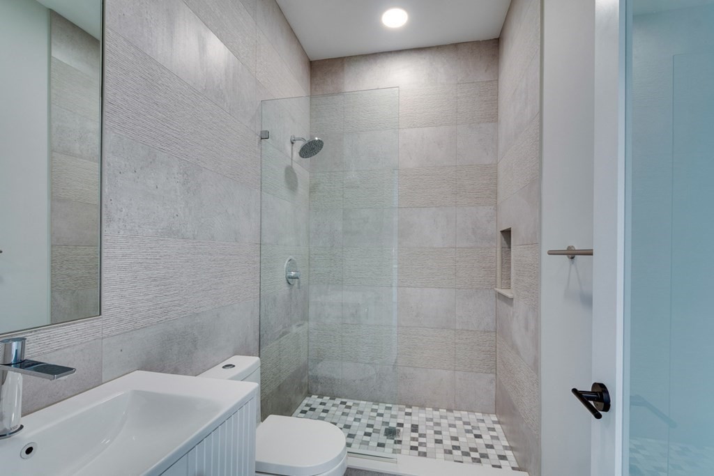 15 Euston Street, Unit 3 Brookline, MA 02446 - Photo 20 of 37 a bathroom with a sink toilet and shower