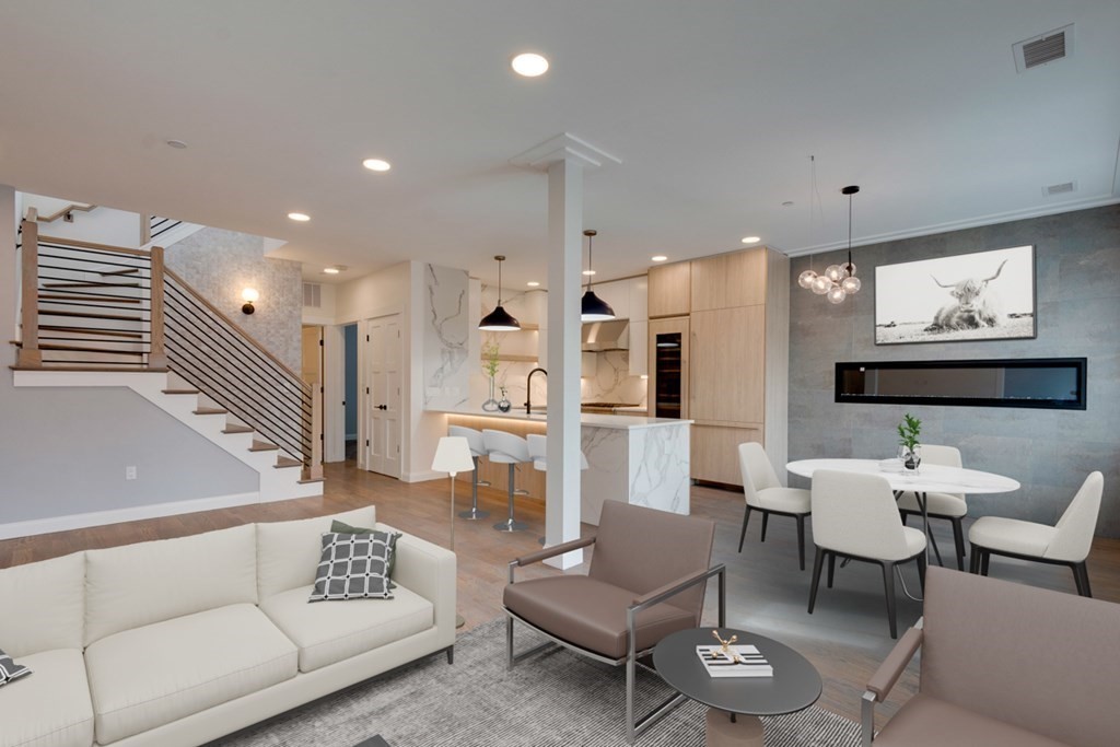 15 Euston Street, Unit 3 Brookline, MA 02446 - Photo 7 of 37 a living room with furniture kitchen view and a large window