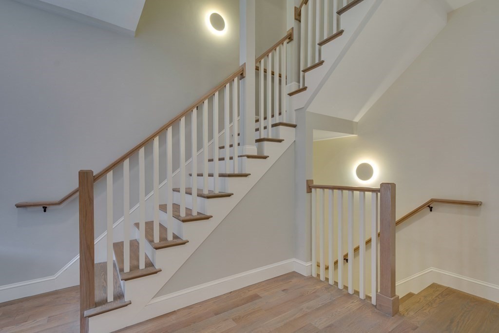 15 Euston Street, Unit 3 Brookline, MA 02446 - Photo 9 of 37 a view of entryway with wooden floor