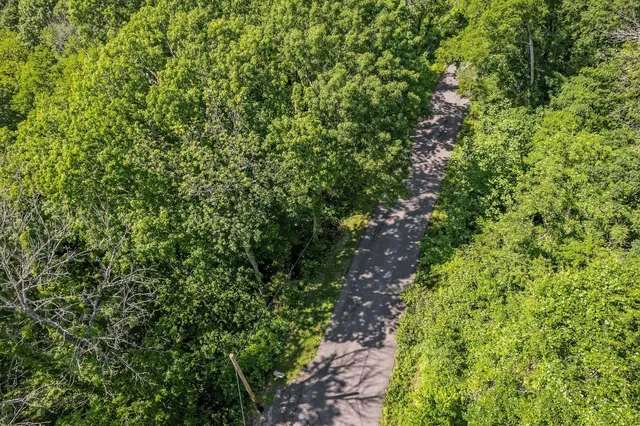 a view of a green field with lots of green space