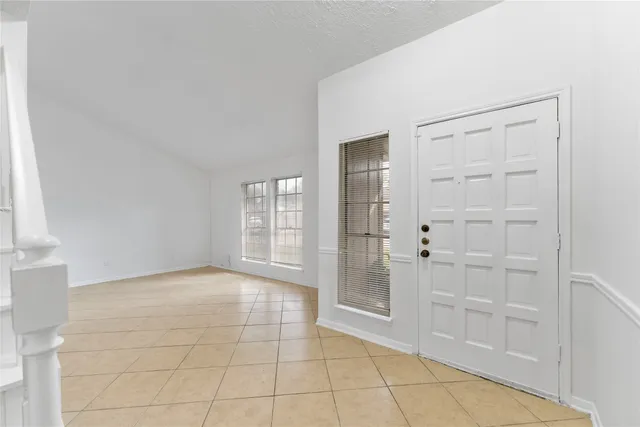 a view of an empty room with window