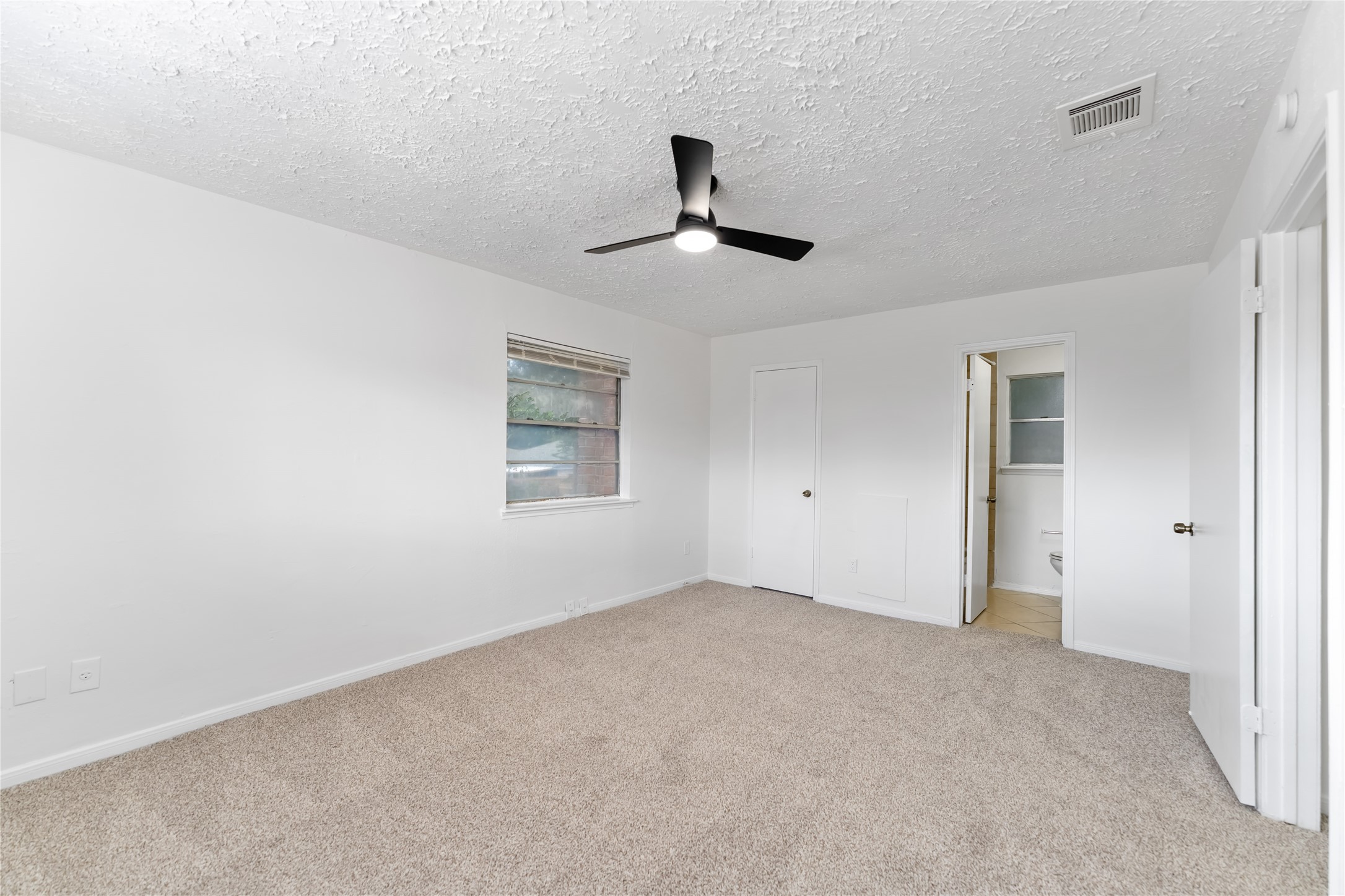 4927 Glendower Drive Spring, TX 77373 - Photo 14 of 22 a view of an empty room with a window