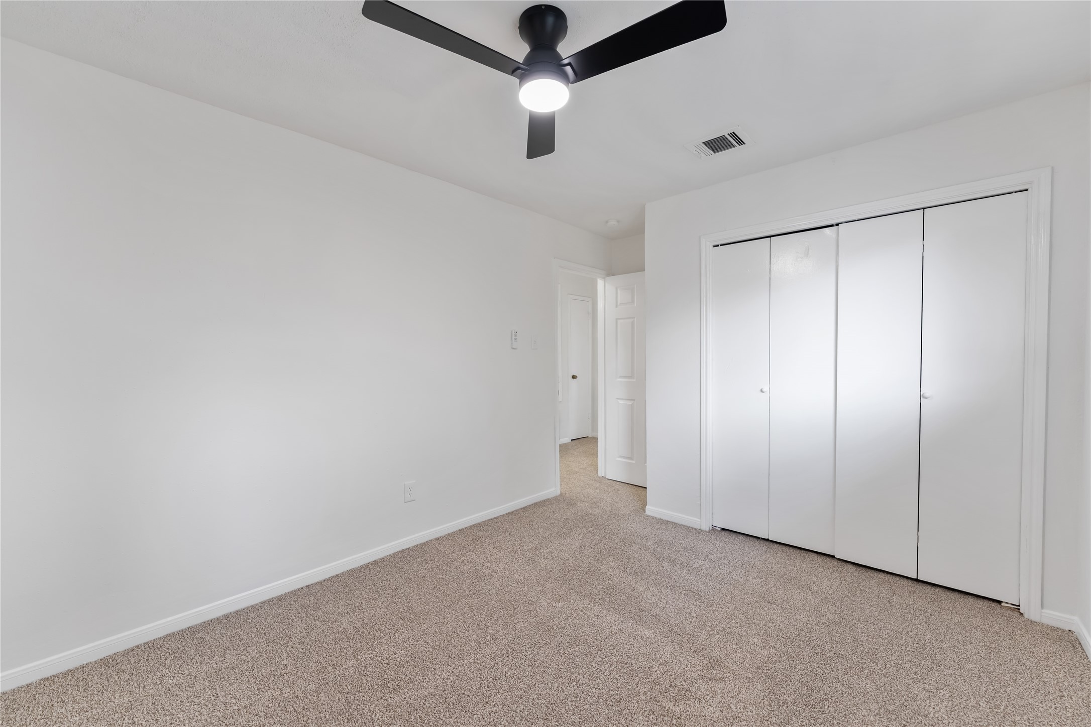 4927 Glendower Drive Spring, TX 77373 - Photo 19 of 22 a view of an empty room with a window