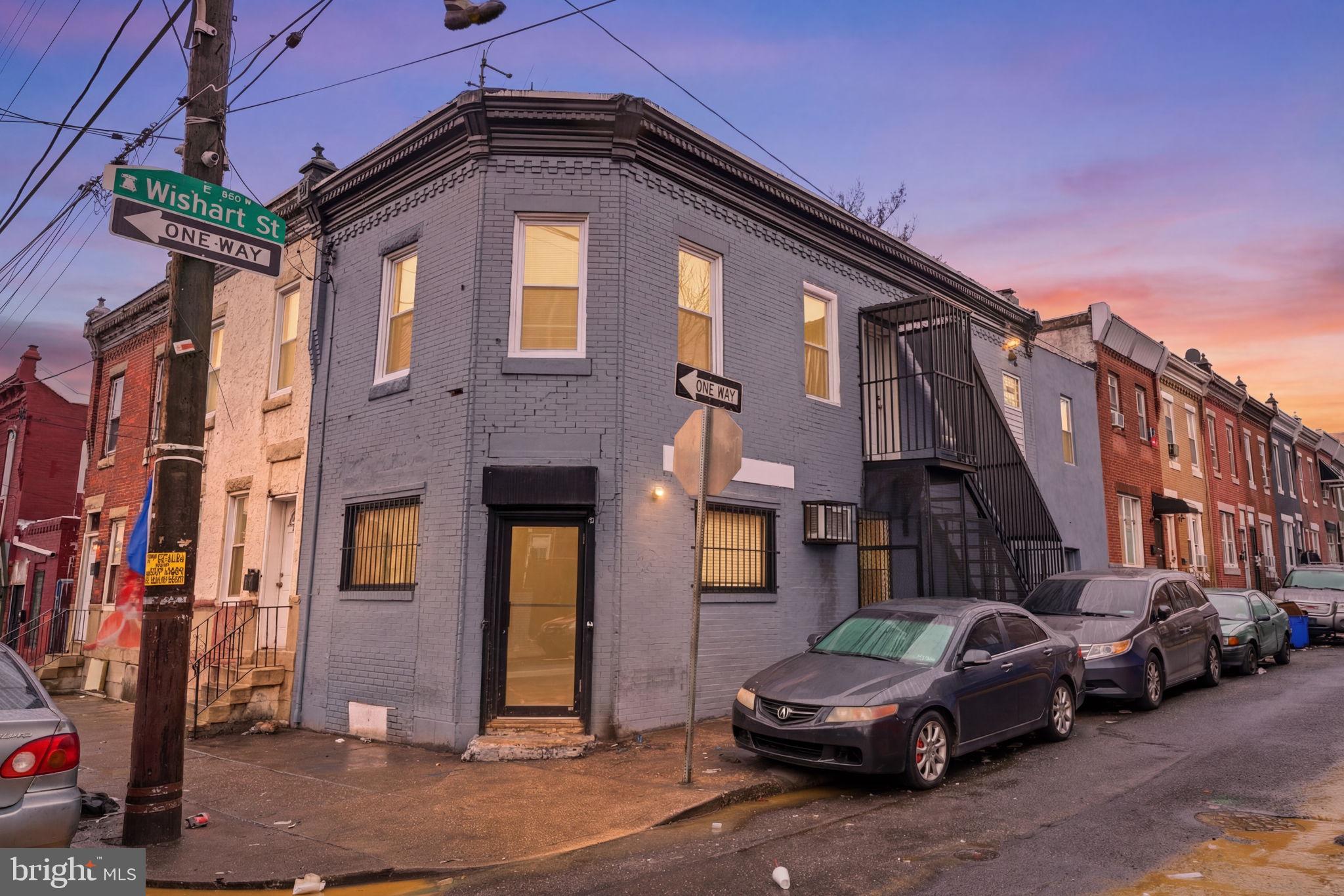 a front view of a house with parking