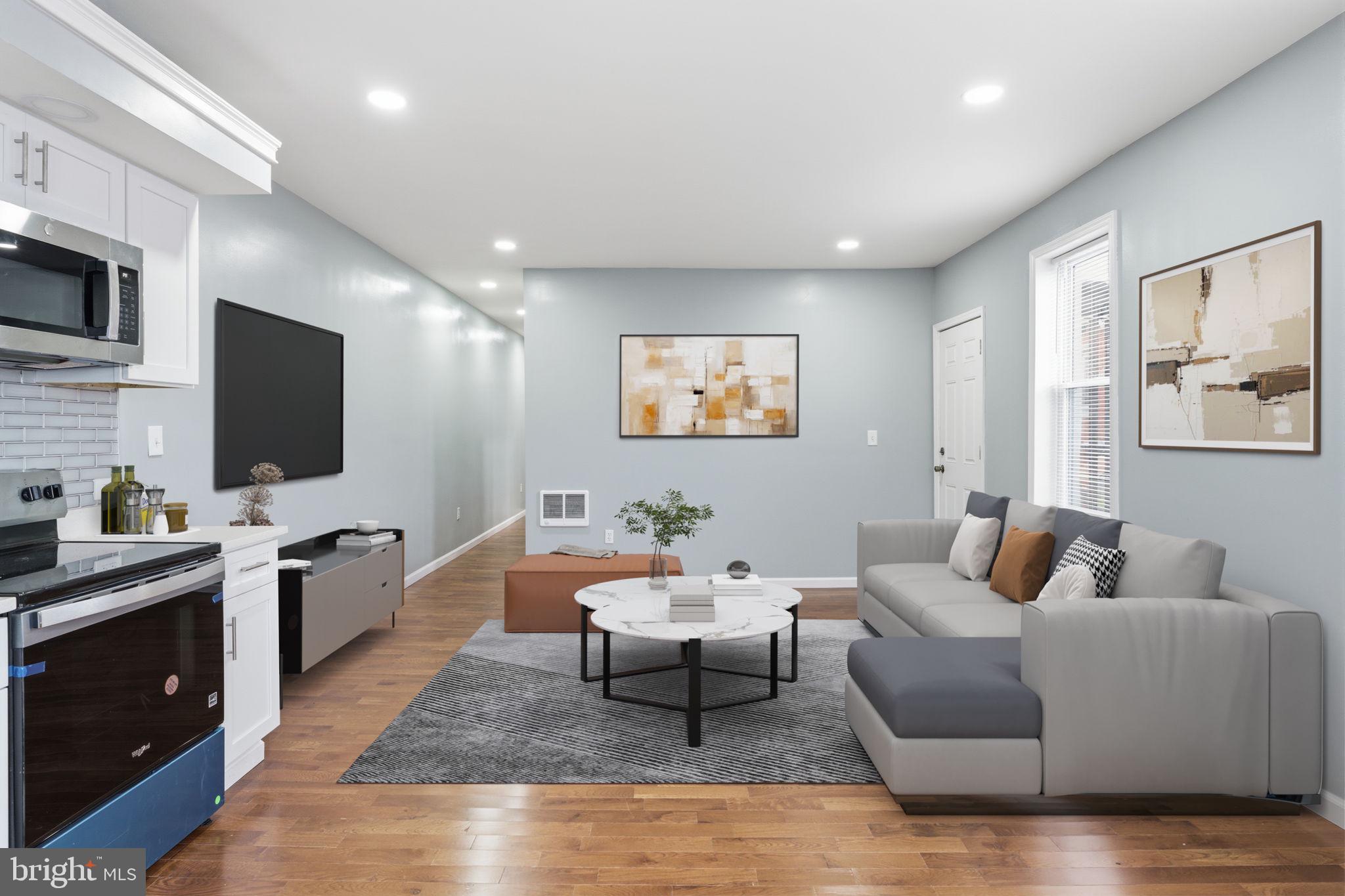 3128 F Street Philadelphia, PA 19134 - Photo 20 of 30 a living room with furniture and a flat screen tv