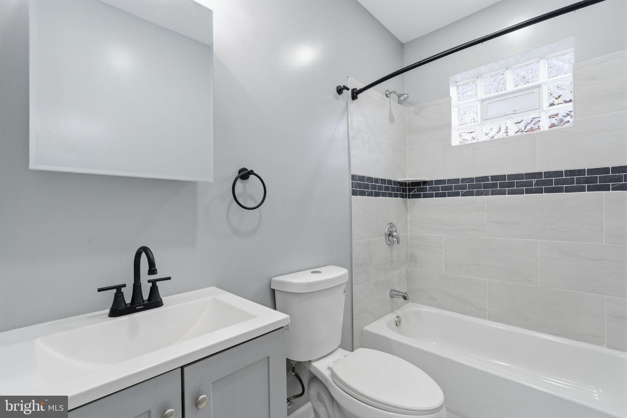 3128 F Street Philadelphia, PA 19134 - Photo 28 of 30 a bathroom with a sink toilet and shower