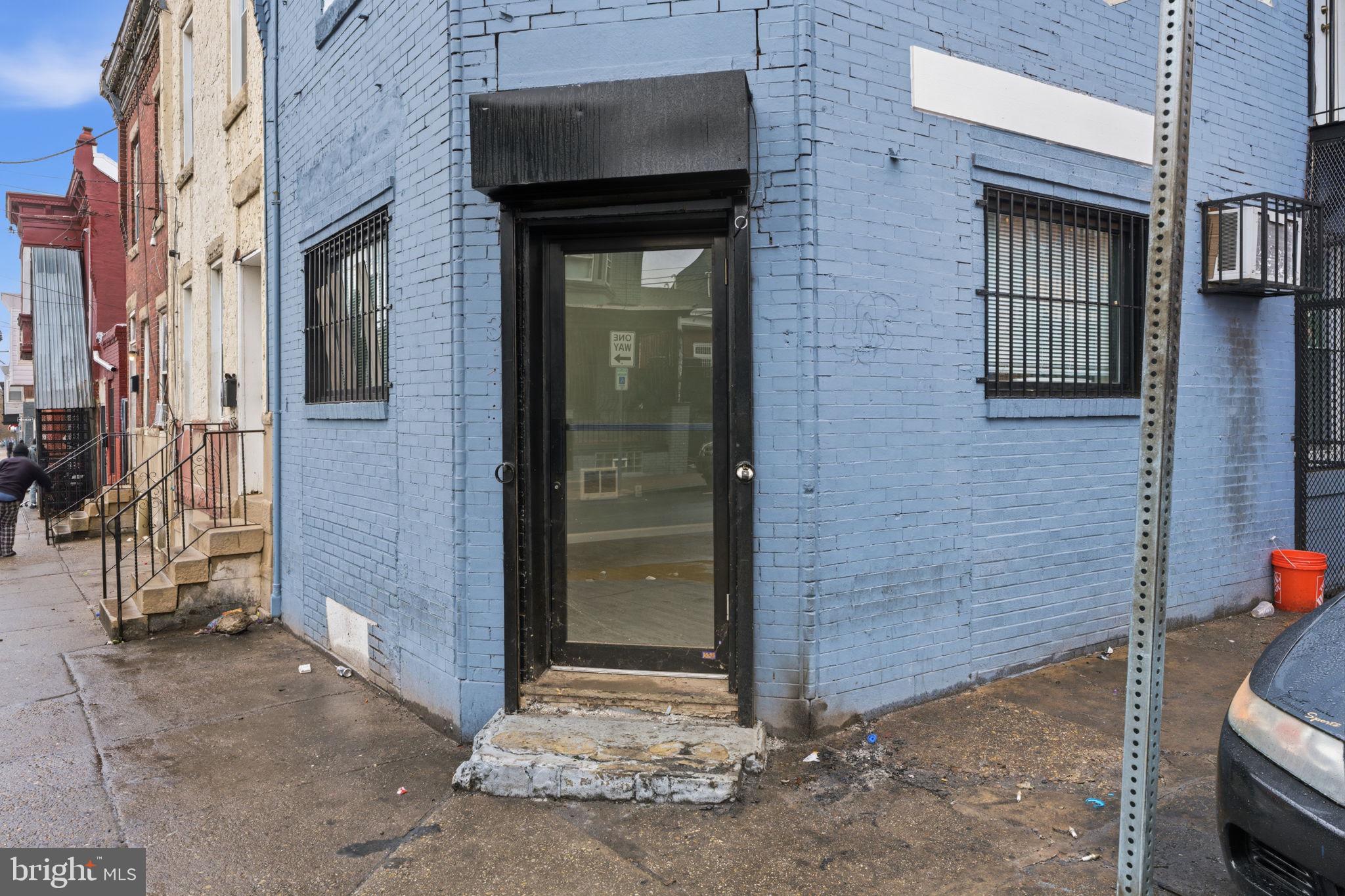 3128 F Street Philadelphia, PA 19134 - Photo 3 of 30 a brick building with a door and a door