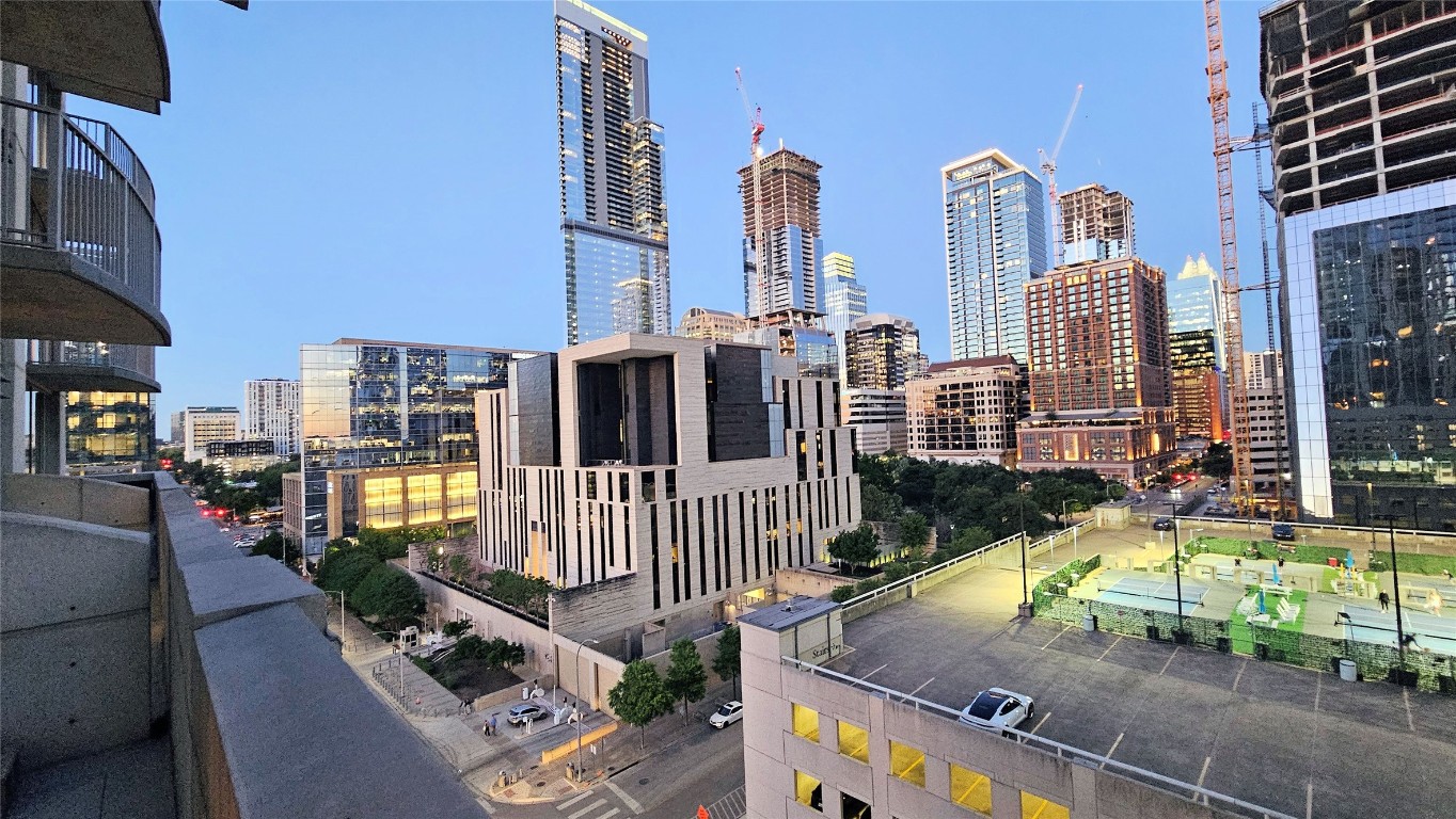 360 Nueces Street, Unit 913 Austin, TX 78701 - Photo 13 of 30 a view of a balcony with chairs