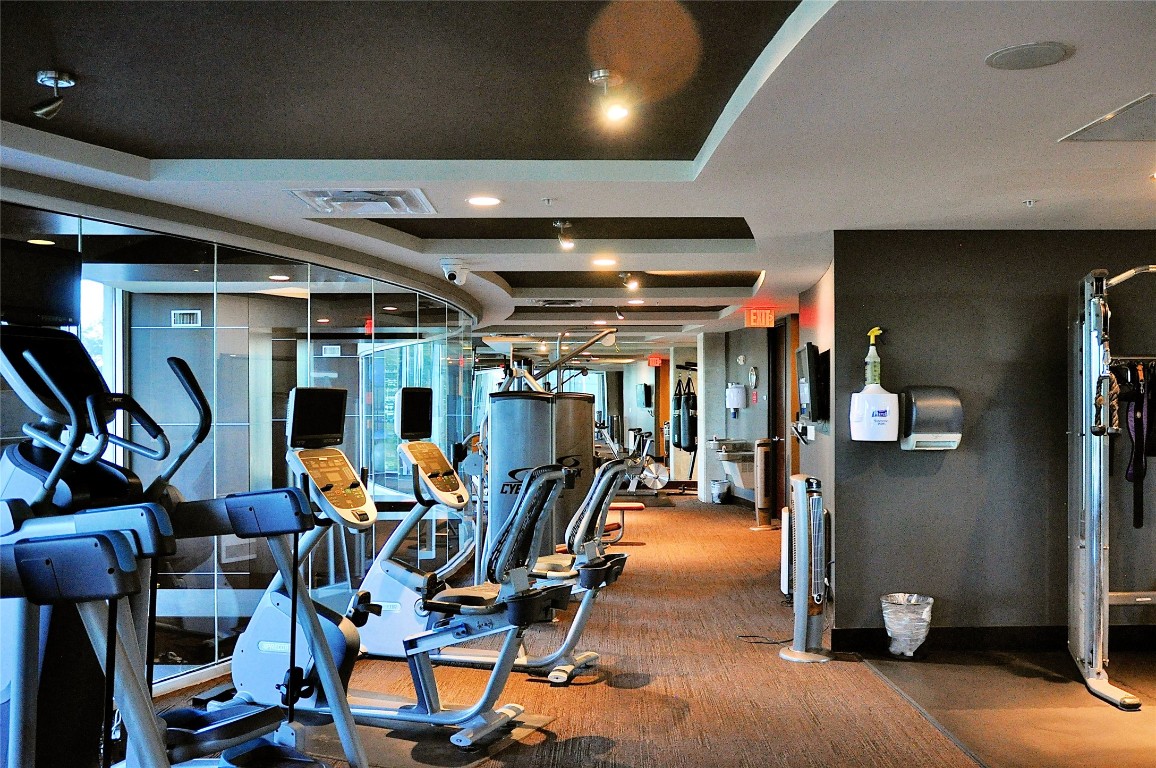 360 Nueces Street, Unit 913 Austin, TX 78701 - Photo 16 of 30 a view of a room with gym equipment
