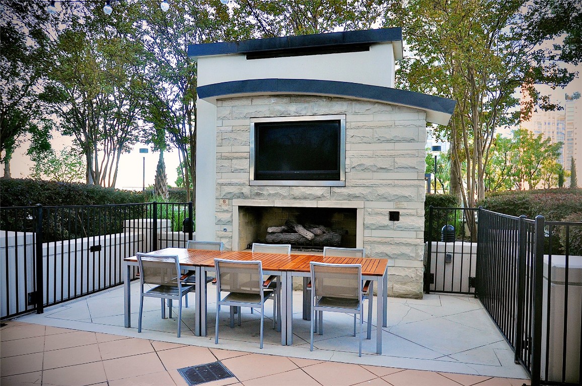 360 Nueces Street, Unit 913 Austin, TX 78701 - Photo 22 of 30 a outdoor space with a fireplace