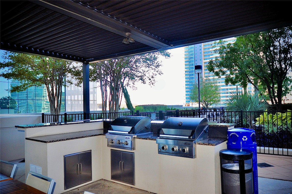 360 Nueces Street, Unit 913 Austin, TX 78701 - Photo 23 of 30 a view of a patio filled with furniture