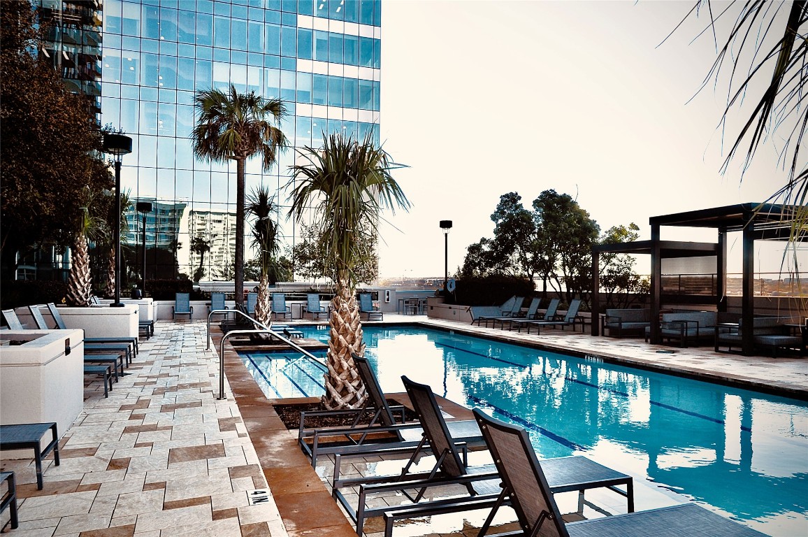 360 Nueces Street, Unit 913 Austin, TX 78701 - Photo 25 of 30 a view of a swimming pool with chairs