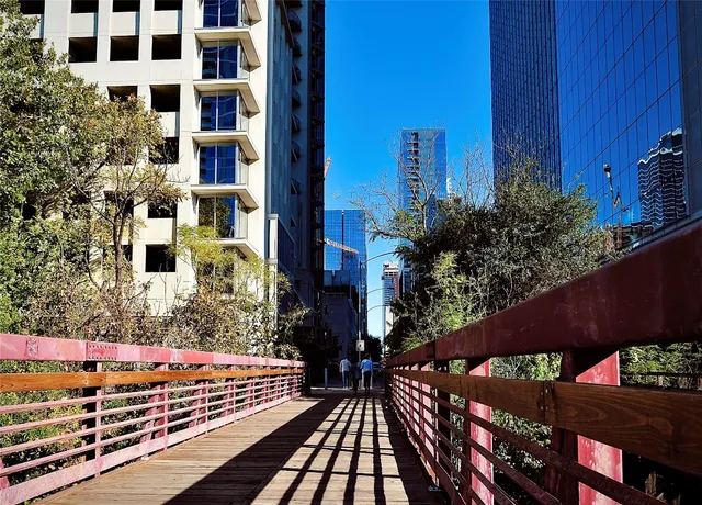 a front view of a house with outdoor space and seating