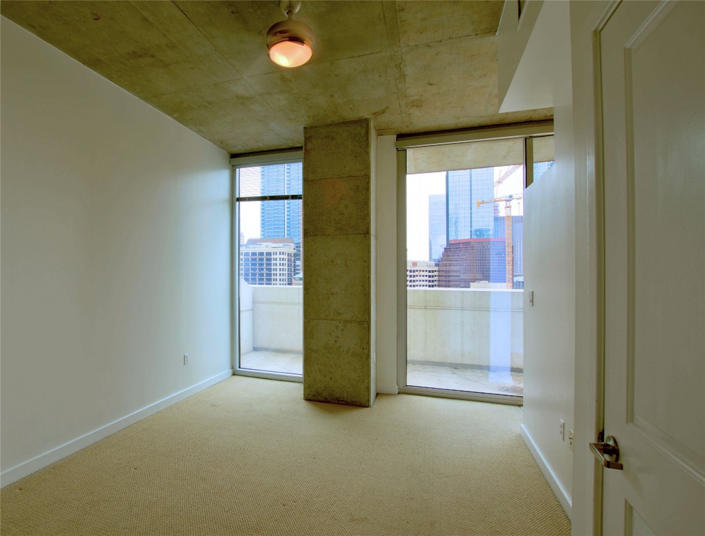360 Nueces Street, Unit 913 Austin, TX 78701 - Photo 7 of 30 a view of an empty room and a window