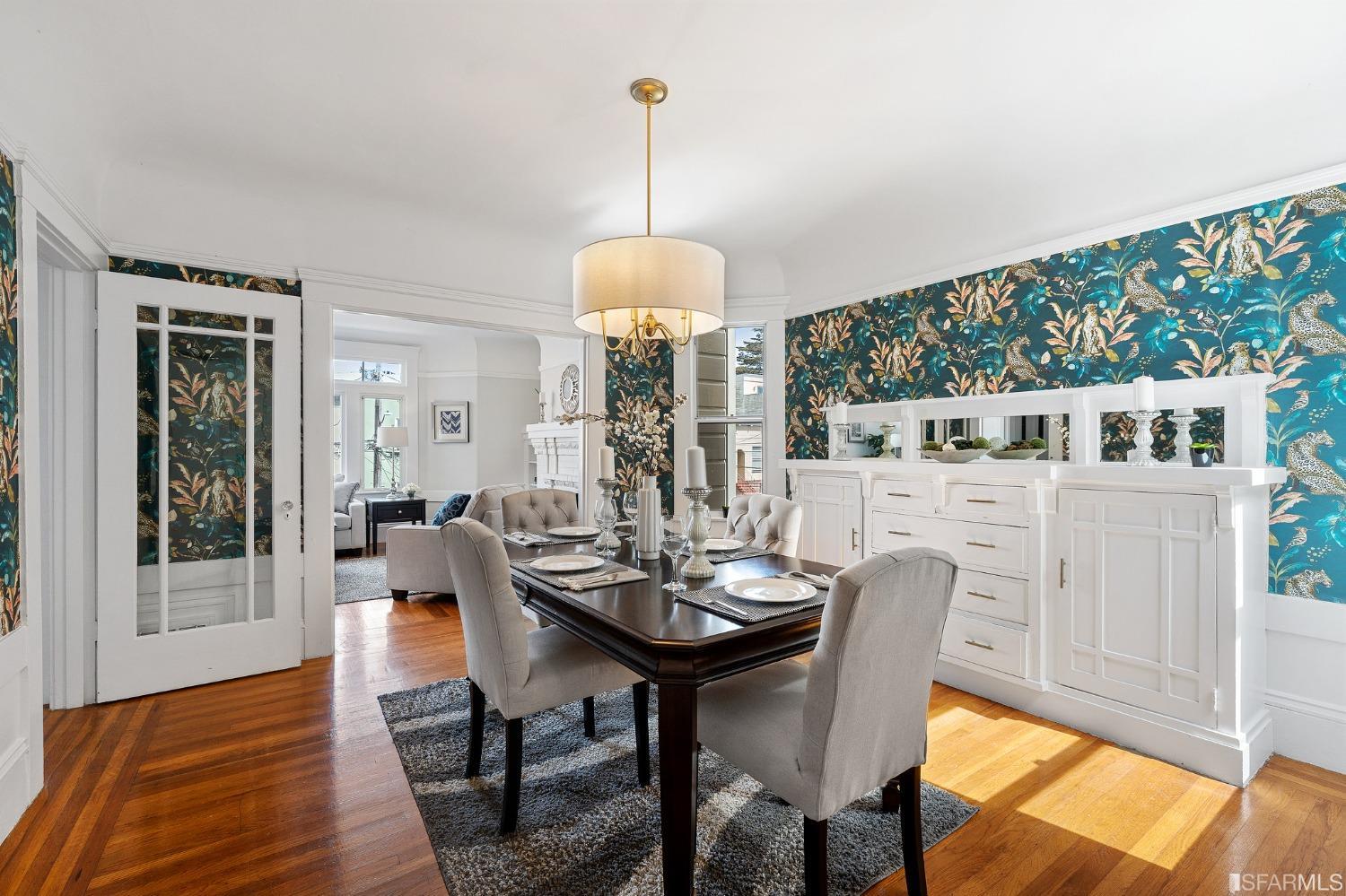 439-441 11th Avenue San Francisco, CA 94118 - Photo 13 of 73 a view of a dining room with furniture window and wooden floor