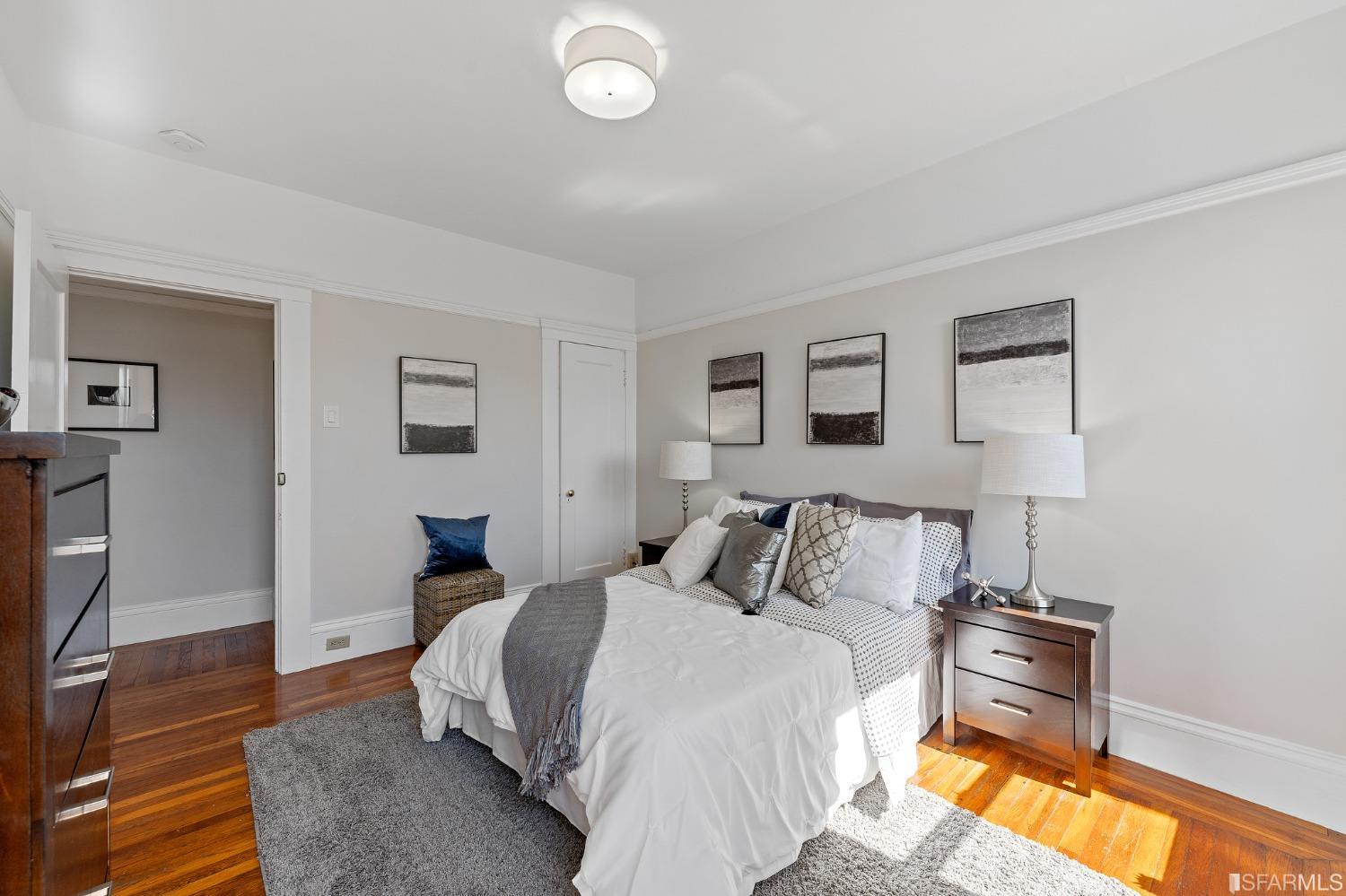 439-441 11th Avenue San Francisco, CA 94118 - Photo 23 of 73 a bedroom with a bed and a view of bathroom