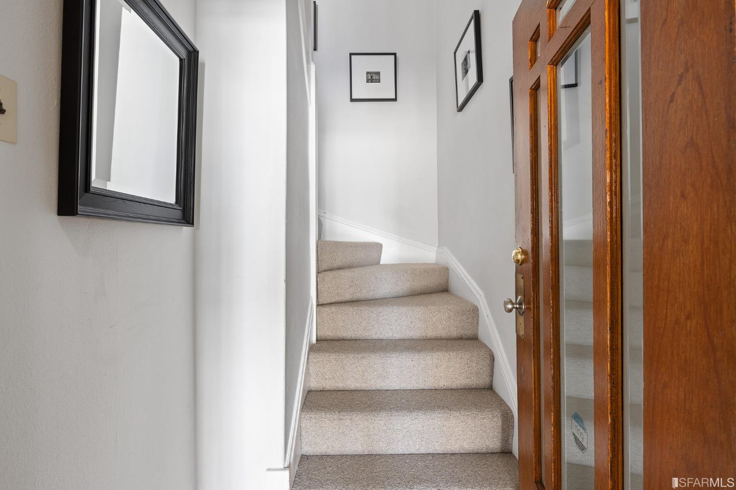439-441 11th Avenue San Francisco, CA 94118 - Photo 33 of 73 a view of staircase with white walls and windows