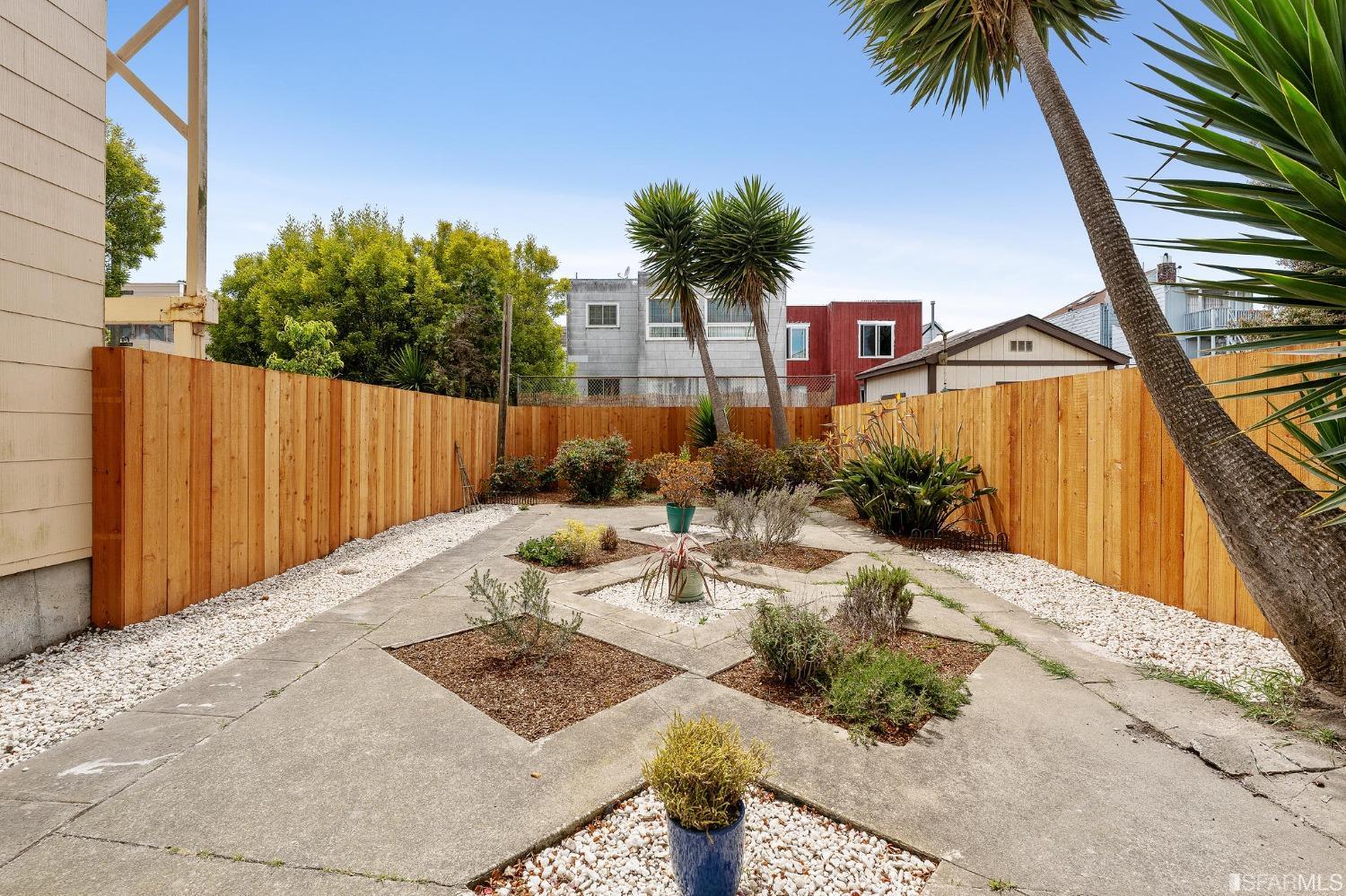 439-441 11th Avenue San Francisco, CA 94118 - Photo 36 of 73 a view of a backyard with a patio