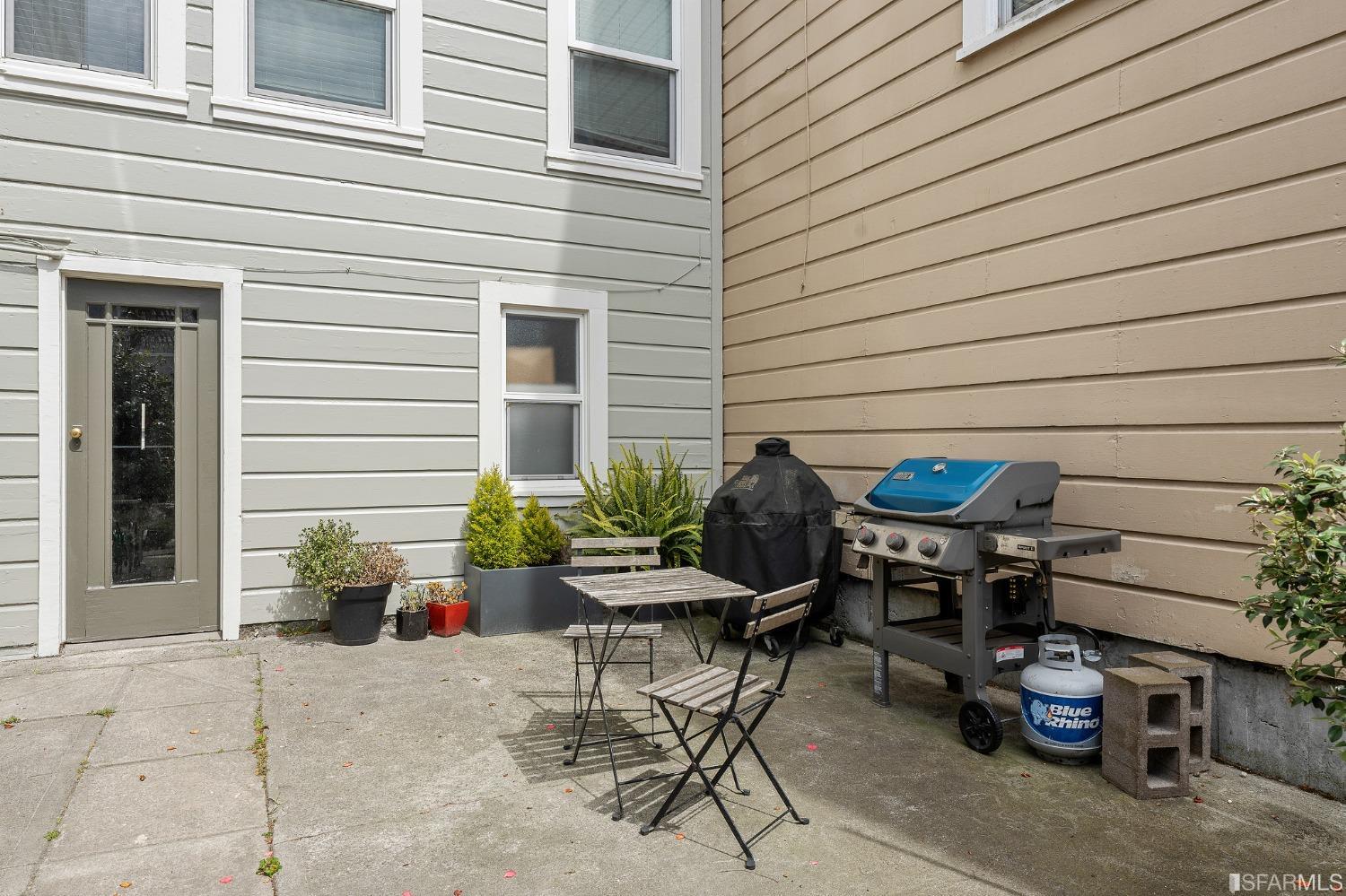 439-441 11th Avenue San Francisco, CA 94118 - Photo 40 of 73 a view of a patio with table and chairs and potted plants