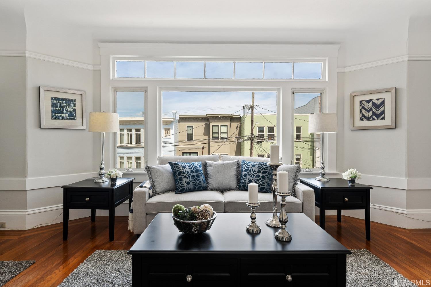 439-441 11th Avenue San Francisco, CA 94118 - Photo 4 of 73 a living room with furniture and a table