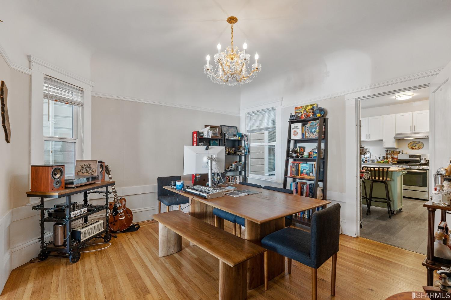 439-441 11th Avenue San Francisco, CA 94118 - Photo 42 of 73 a view of a dining room with furniture wooden floor and a rug