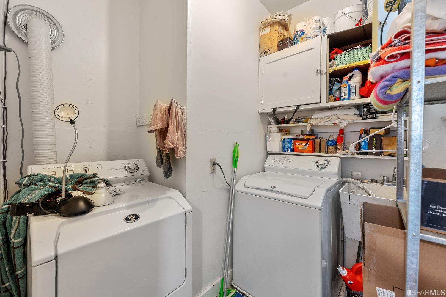 439-441 11th Avenue San Francisco, CA 94118 - Photo 49 of 73 a utility room with dryer and washer
