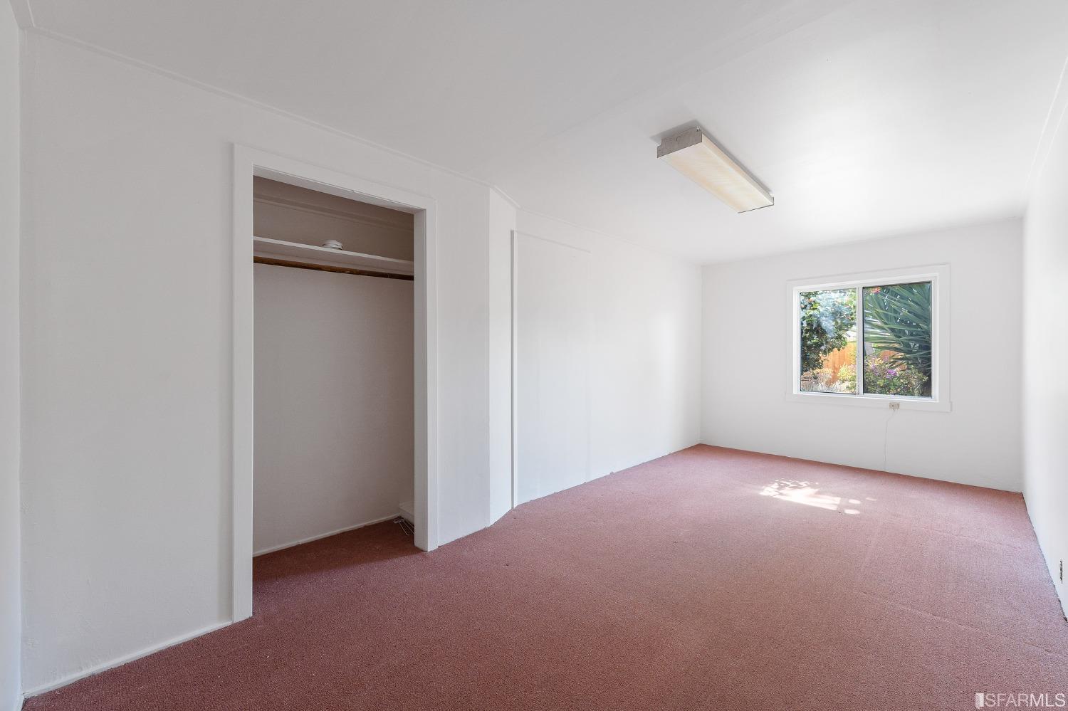 439-441 11th Avenue San Francisco, CA 94118 - Photo 52 of 73 an empty room with windows and closet