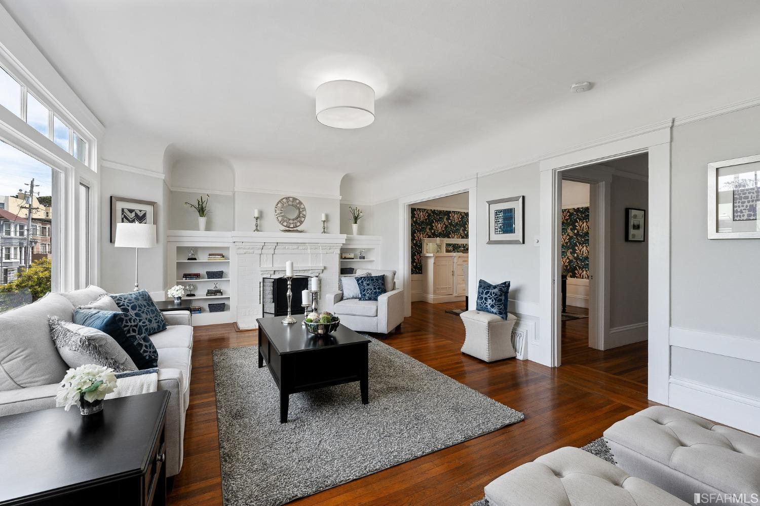 439-441 11th Avenue San Francisco, CA 94118 - Photo 8 of 73 a living room with furniture fireplace and window