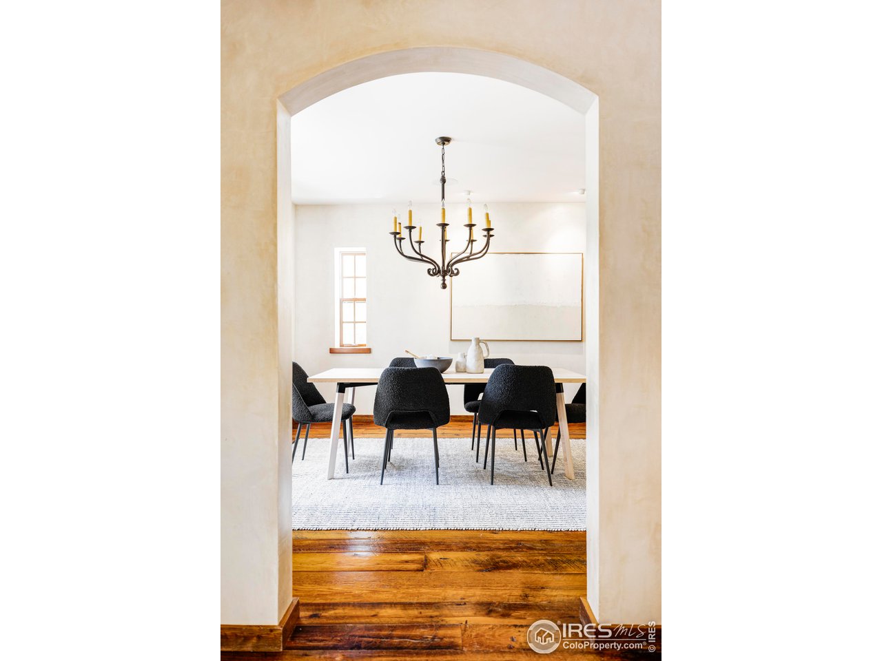 1213 17th Street Boulder, CO 80302 - Photo 16 of 38 a view of living room with furniture and a chandelier
