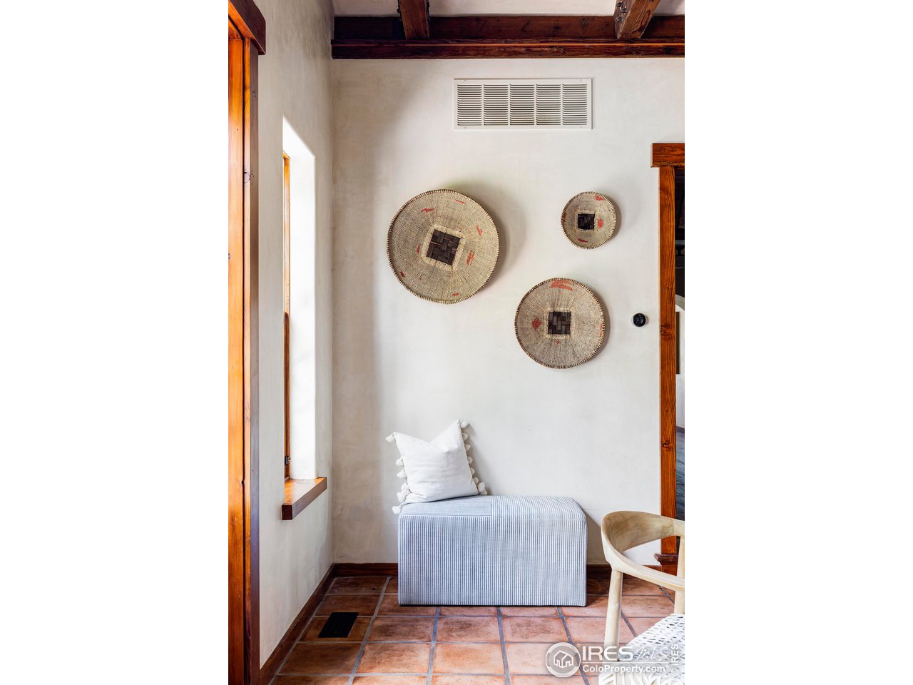 1213 17th Street Boulder, CO 80302 - Photo 18 of 38 a view of storage and utility room with a washer and dryer