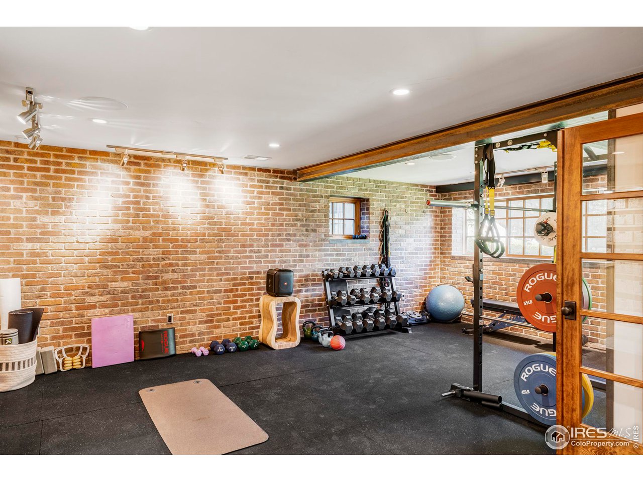 1213 17th Street Boulder, CO 80302 - Photo 25 of 38 a view of a room with gym equipment