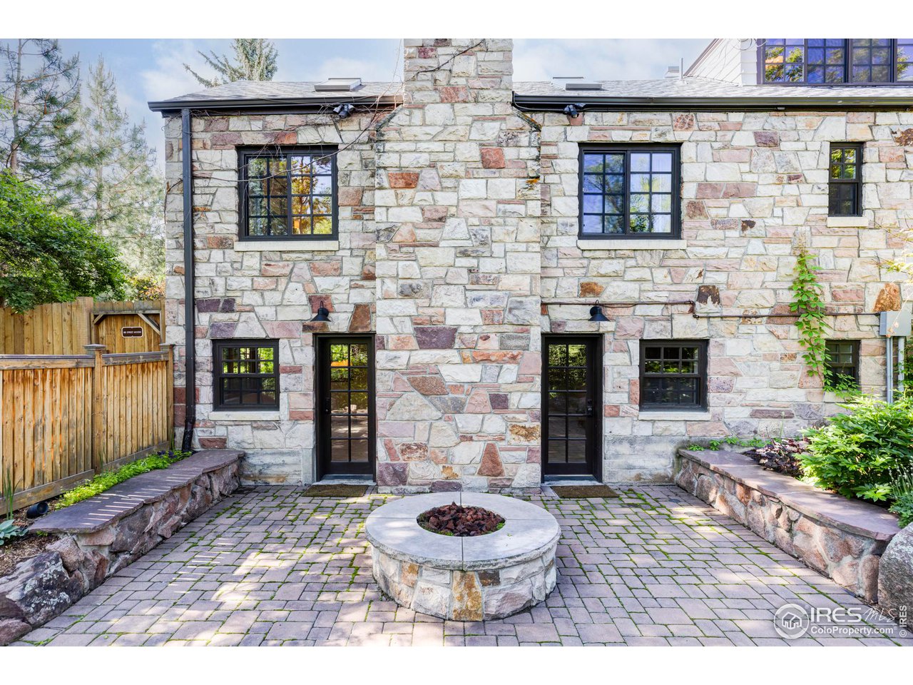1213 17th Street Boulder, CO 80302 - Photo 27 of 38 a front view of a house with patio