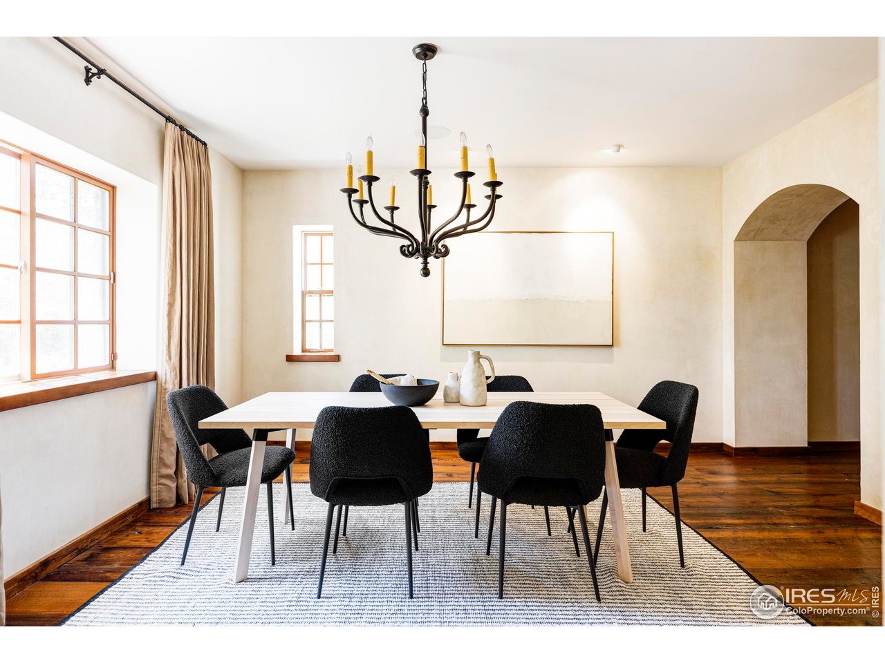 1213 17th Street Boulder, CO 80302 - Photo 4 of 38 a dining room with furniture and wooden floor
