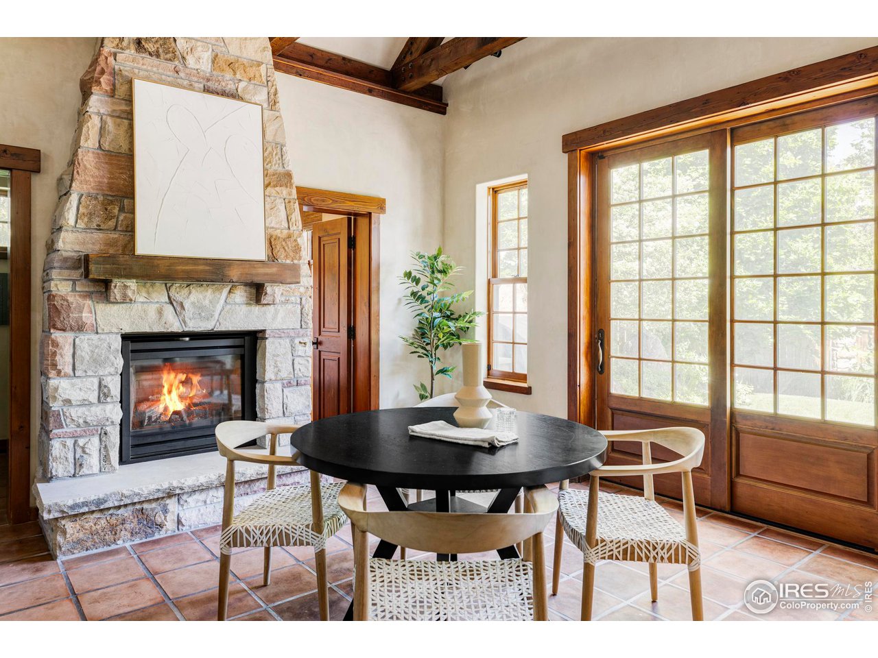 1213 17th Street Boulder, CO 80302 - Photo 8 of 38 a living room with furniture and a fireplace