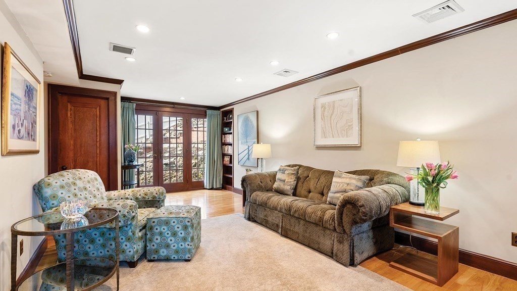 16 Conant Road Brookline, MA 02467 - Photo 11 of 31 a living room with furniture and a large window