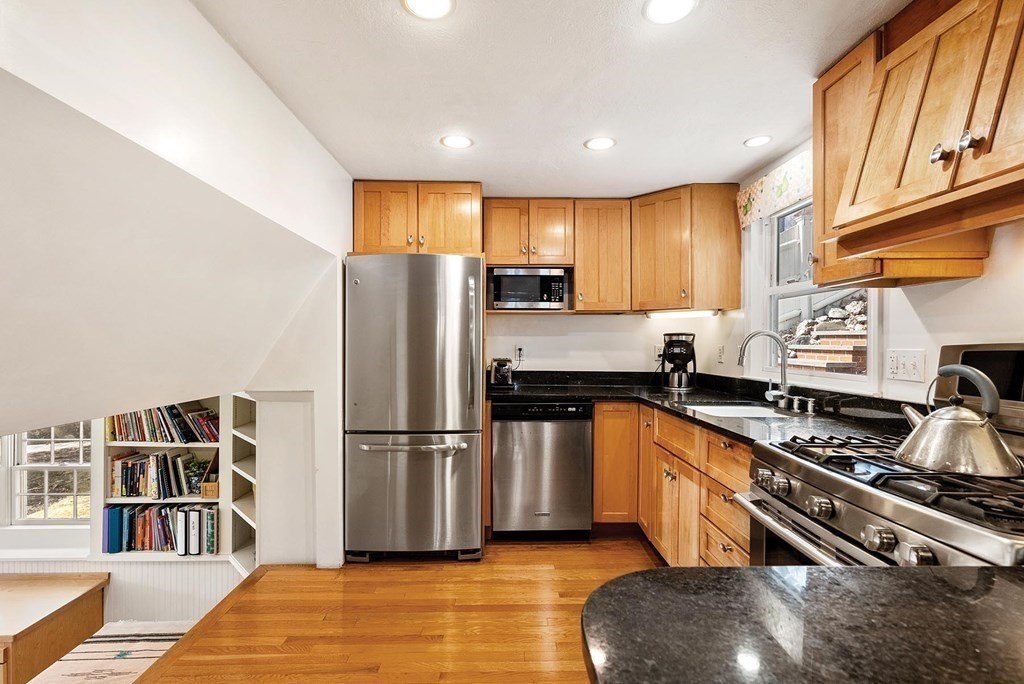 16 Conant Road Brookline, MA 02467 - Photo 14 of 31 a kitchen with stainless steel appliances granite countertop a refrigerator stove top oven and sink